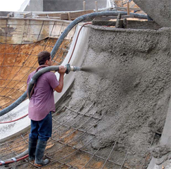 Shotcrete is applied to a ramp. The bulk of this job was shotcrete work. January 2010