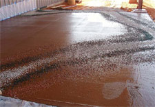 Glass, slate and motherof-pearl shells were seeded onto this exterior slab.