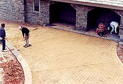 <Michael Archambault stamped driveway>