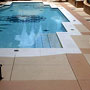 Restoring color in previously installed concrete