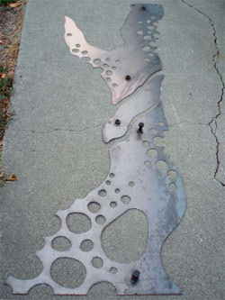 A steel template for sandblasting.