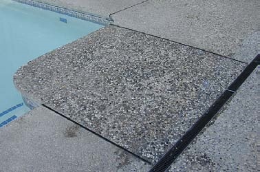 How to clean exposed aggregate concrete around pool