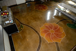 stained flowers and vines on concrete floors