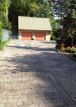 stamped concrete driveway that looks like cobblestone