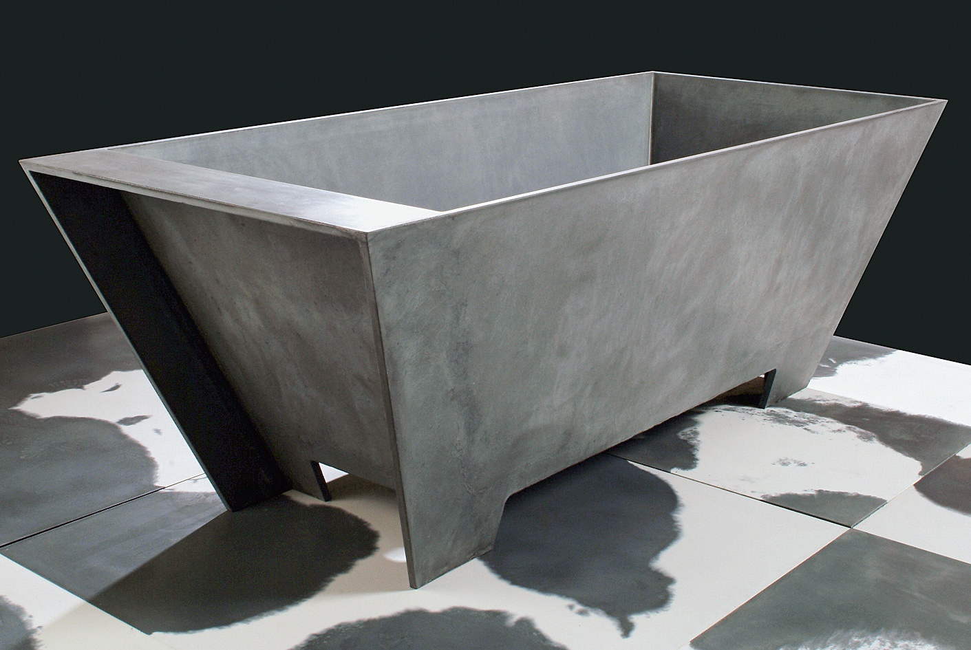 The low permeability and high durability of Ductal makes it an intriguing material for plumbing fixtures. As shown by this tub designed by Francesco Passaniti, the thin sections provide sculptural opportunities not possible with thick concrete tubs or washbasins.