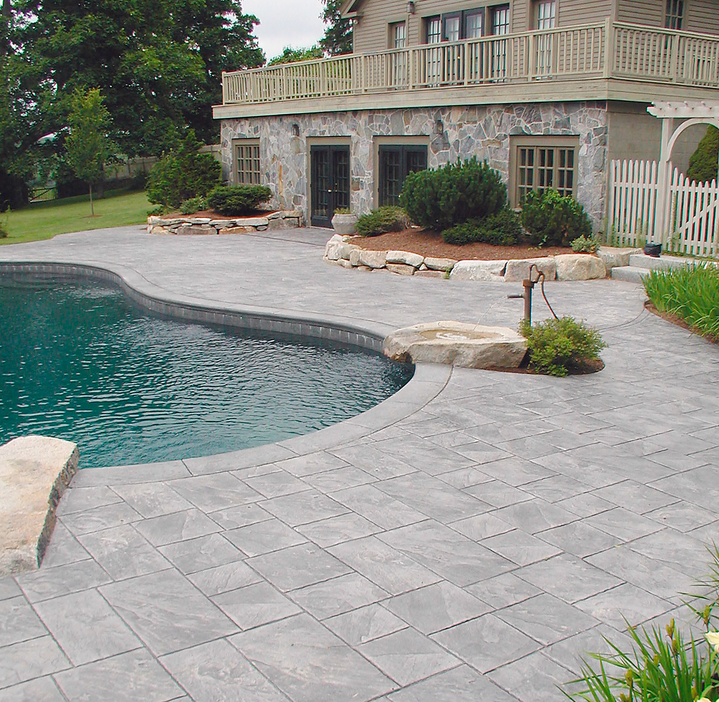 This pool deck has withstood Maine winters for seven years, and it still looks as good as new.