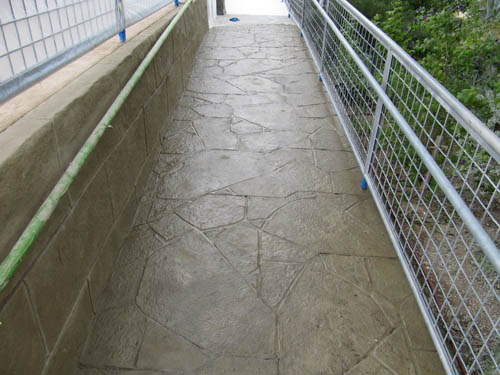 A stamped and stained ADA access ramp.