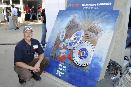 Steven Ochs at Bosch booth with his concrete mural