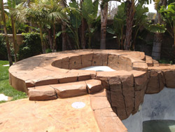 This residential project in Rancho Cucamonga, Calif., included a complete restoration of the rock pool and spa. Kevin Brown of KB Concrete Staining, Mira Loma, Calif., used NewLook materials for the renovation, including the companys SmartColor stain in Milk Chocolate, White, Black and a tan shade.  Photo courtesy of Kevin Brown, KB Concrete Staining