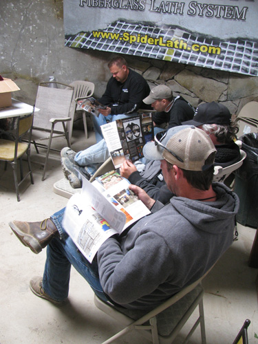 Attendees take a break from learning to read the newest editions of Concrete Decor magazine.