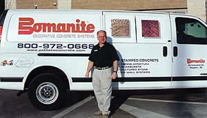 Ira Goldberg, New Jersey Bomanite concrete contractor stands in front of his white van