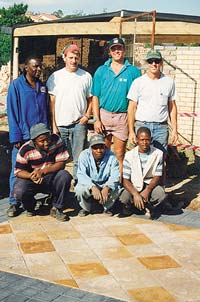 Mike Archambault (back row, far right) with students in Johannesburg, South Africa.