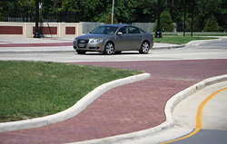 stamped concrete walkway with car Photos courtesy of Shepherd’s Construction Co. Inc.
