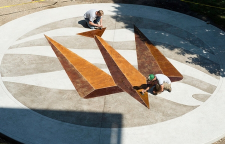 3 dimensional shape stained on a concrete patio