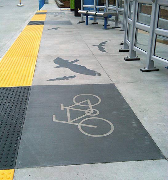 The use of public space for stencils and other concrete art is a great way to indicate signage for bicycles and such.