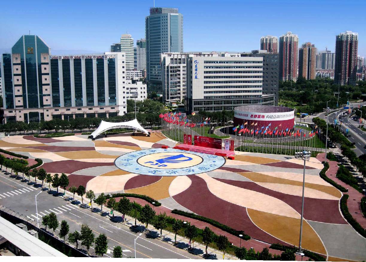 About 2.7 million square feet of pervious concrete was placed in Beijing, China, for the 2008 Summer Olympics. At this location, the blue and gray part of the ring in the middle is made from conventional concrete, while the center of the ring and the outer pattern is integrally colored pervious.