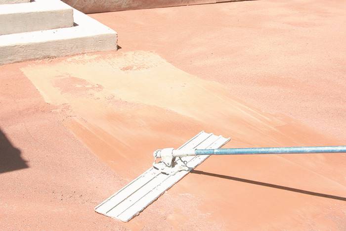 Give dimension to your decorative concrete patio with multiple colors of concrete color hardeners.