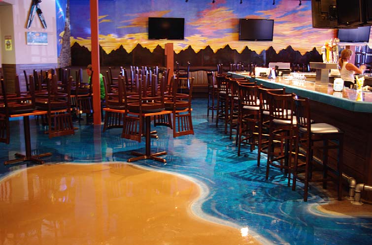 Sand and water look on this restaurant floor done in epoxy overlay systems.