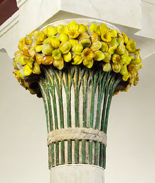 The Daffodil Terrace was named after floral column capitals featuring daffodils in embedded cast and cut glass, in precast natural gray concrete.