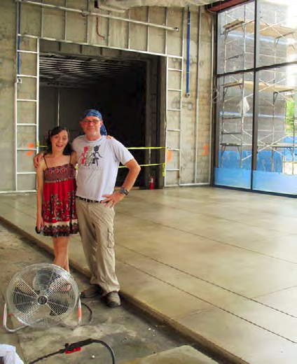 Mike Miller, concretist, and his daughter, field biologist Karley Miller, preen in front of the finished (not so much as a single crack  thats not like him!) Daffodil Terrace slab.
