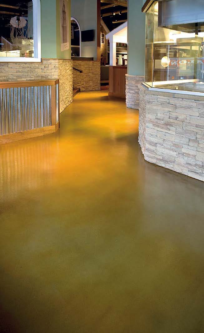 A yellow stained concrete floor that gives a clean look to the space.