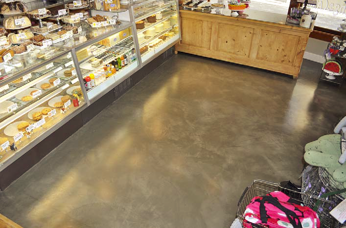 A simple, clean gray concrete epoxy in the floor of this bakery.