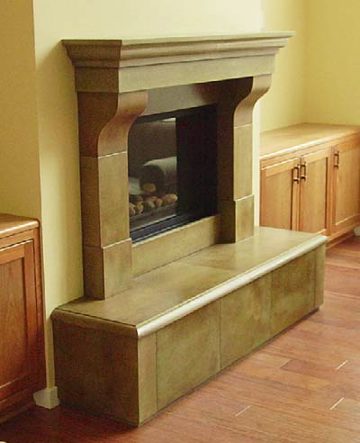 A concrete fireplace adds an elegant feel to this room.