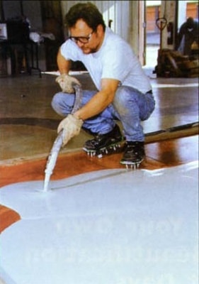 Properly cleaning existing substrate prior to installing a concrete overly is the first step in the basics of concrete overlays