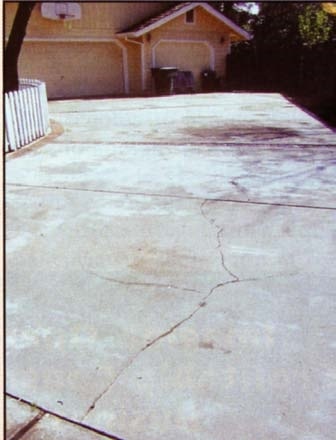 Using a concrete overlay over a cracked slab may not hide the crack for long.