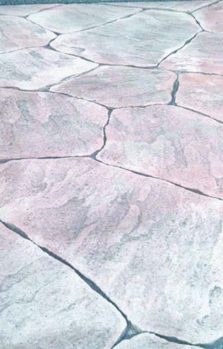 Challenges for colored driveways in the mountains, using color hardener holds up in higher altitudes.