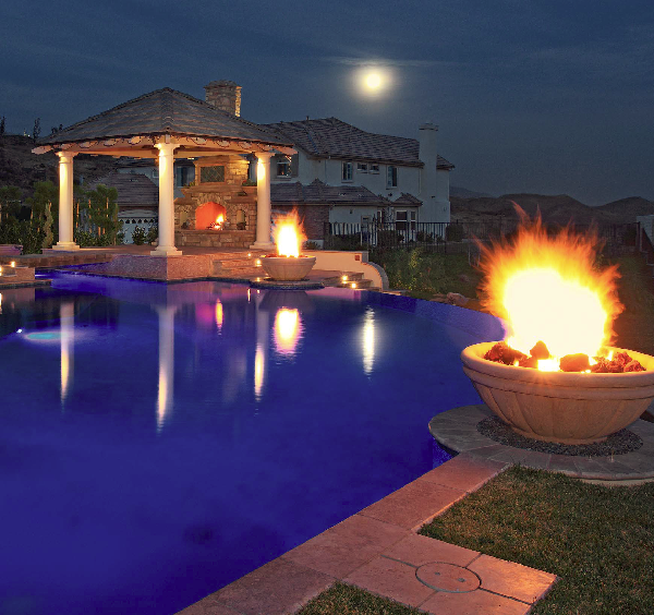 This firepit brings a very dramatic feel to the outdoor space.