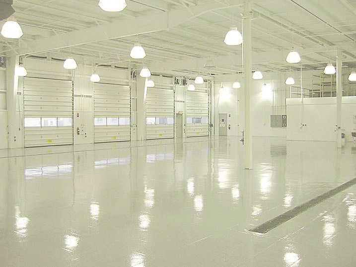 A completely white garage with white walls and a white floor.