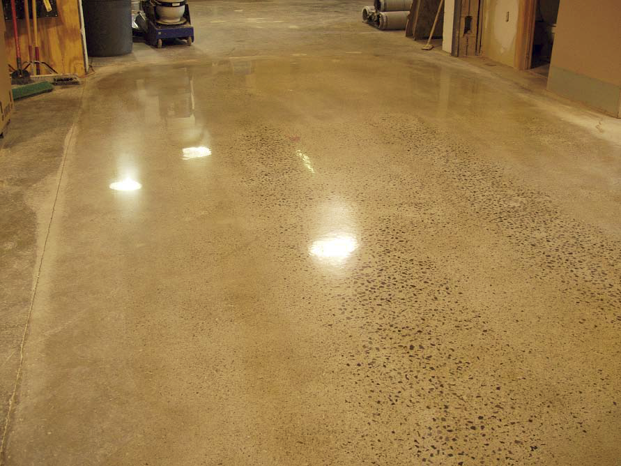 Polished concrete floor to expose the aggregate.