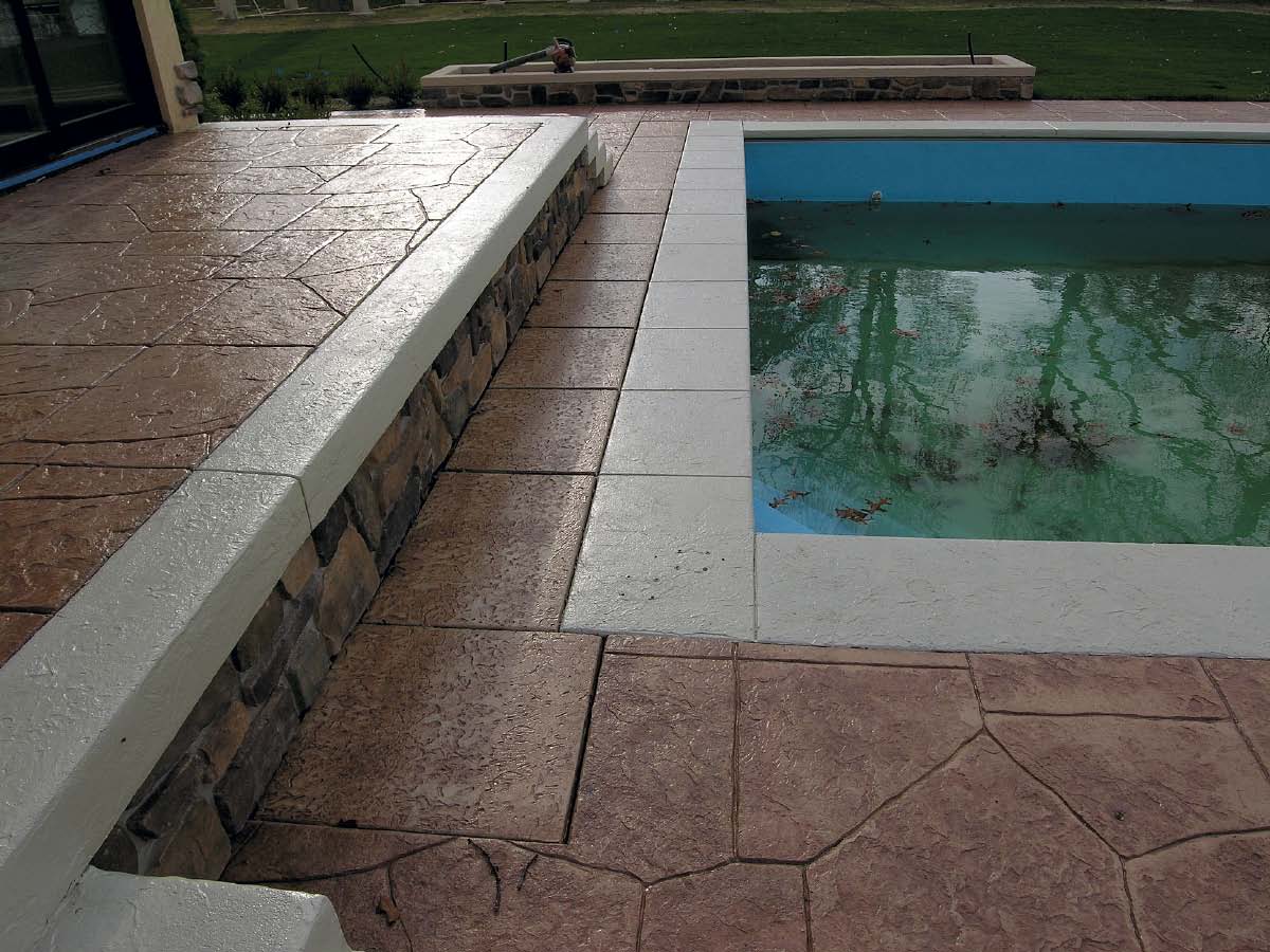 Poolside stamped concrete with multiple colors
