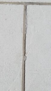 Concrete grout lines messed up with tape