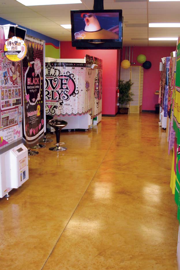 Salon floor stained concrete handles daily sweeping and cleaning.