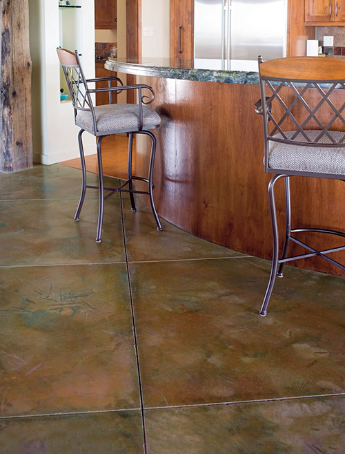 Gaye Goodman shows her acid-staining technique off in this concrete floor with control joints.