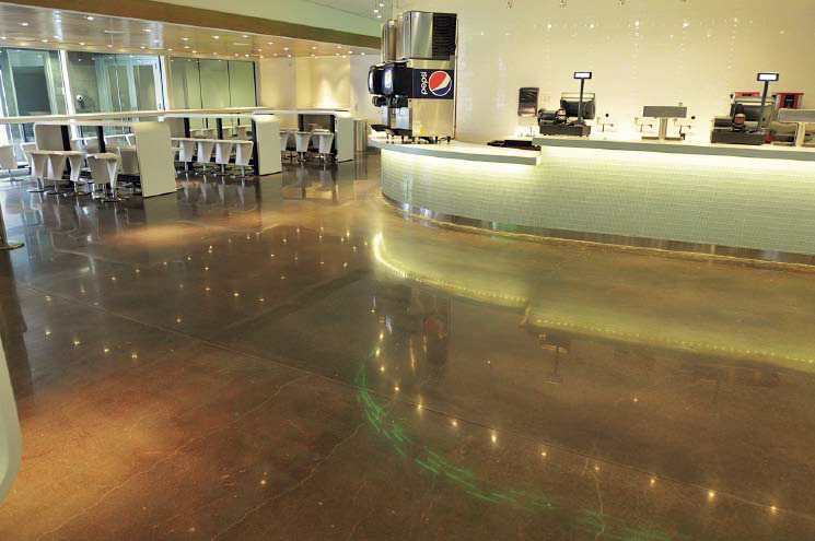Polished and colored concrete in a food court is an easy to clean alternative for flooring in high-traffic areas.