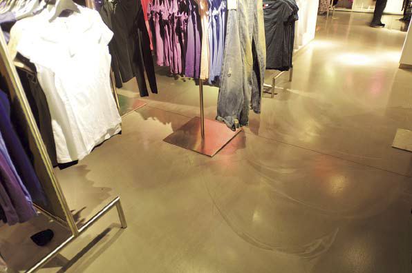 Retail space is completed with a stained concrete floor.