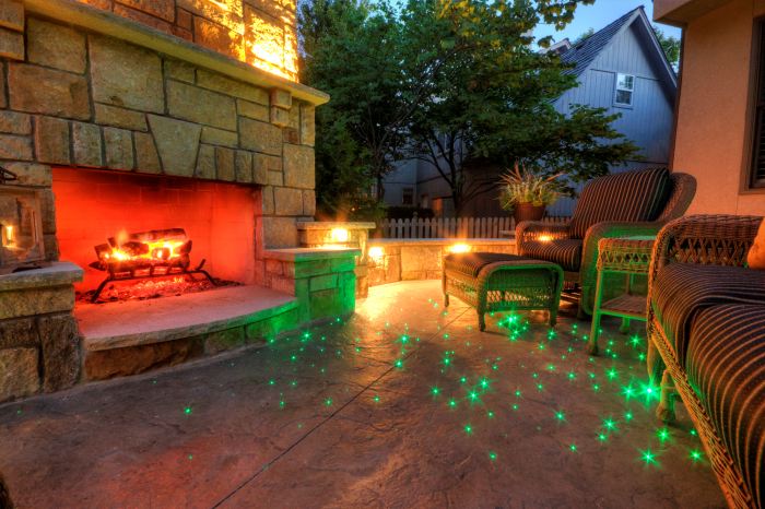 A hot knife is used to cut the ends of the fiber optic lights after the colored stamped concrete has cured.