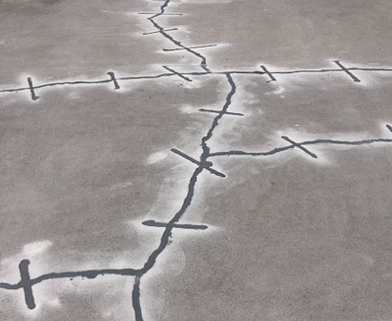 A look at a large repair of cracked concrete using The Concrete Staple