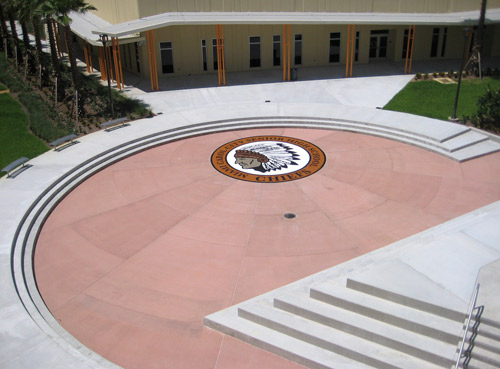 Once Miami-based GC Coastal Construction Group had poured and placed the concrete, they enlisted the aid of Custom Concrete Designs of Florida for the placement of the stencil design that would become the 26-foot logo.