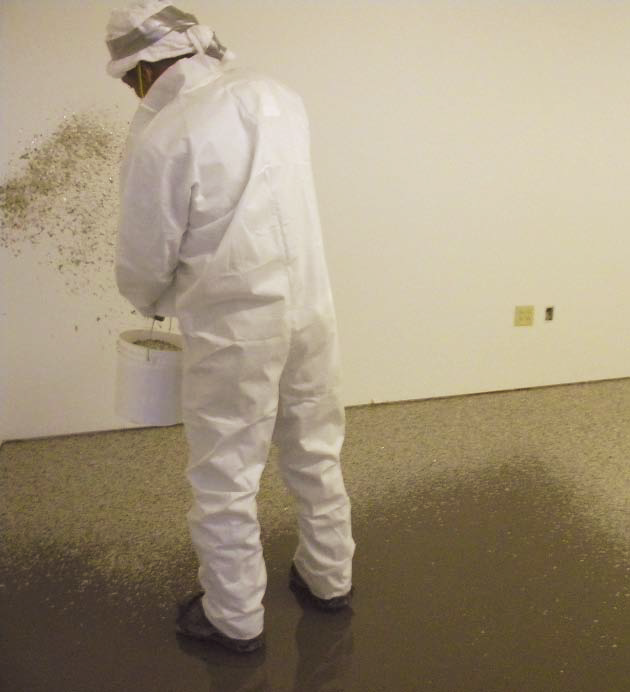 Crew members for Nashville-based Fuller Industries Inc. install a mica chip floor at a Nashville book and CD store using mica chips from Torginol and Florock polymers.