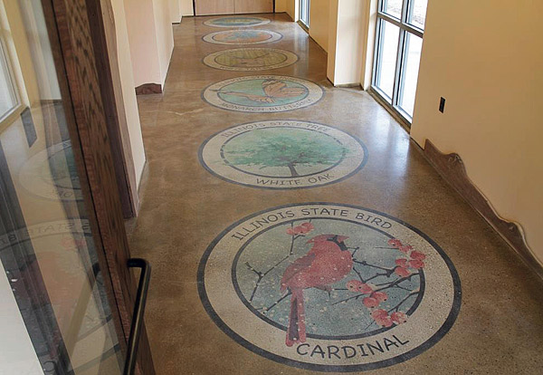 logos stained into concrete floor