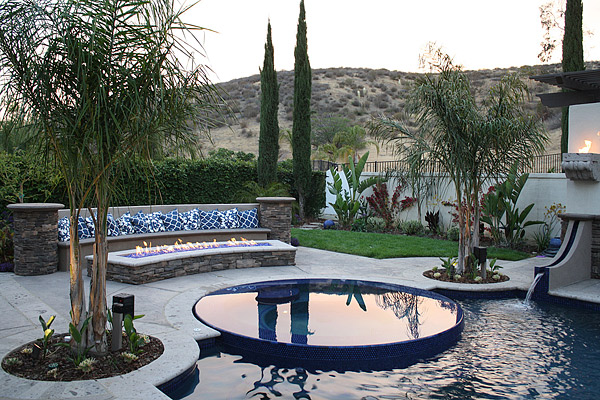 Concrete fire pit and swimming pool