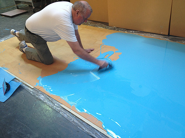 In this demonstration, a man applies a flexible epoxy to a surface
