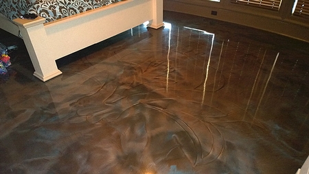 A floral design appears as a ghostly imprint in the metallic floors.