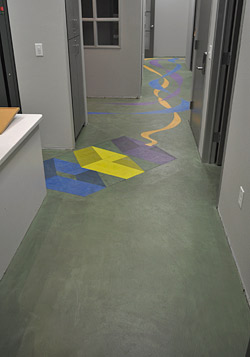 wayfinding on a colorful concrete floor
