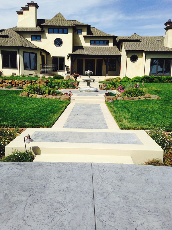 Restored decorative concrete patios and walkways,