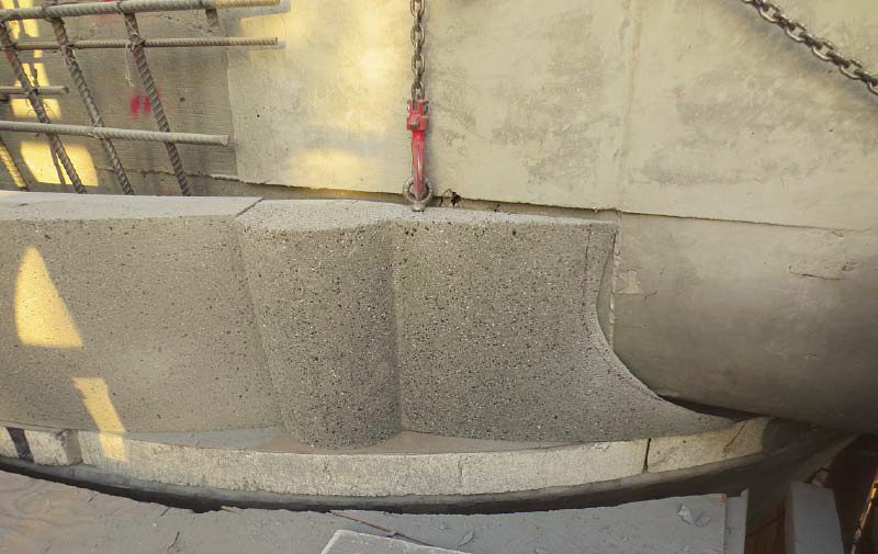 A closer look at the concrete attachment to create the basket.